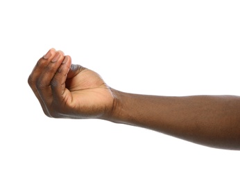 Photo of African-American man holding something in hand on white background, closeup