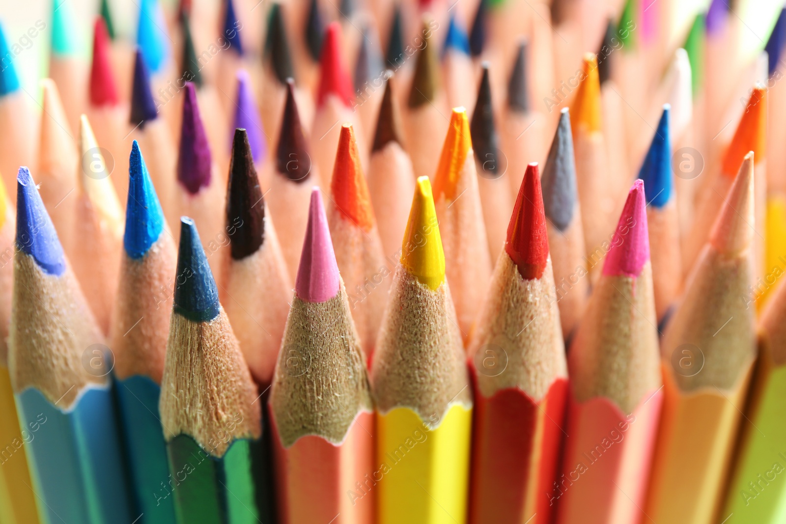 Photo of Different color pencils as background, closeup view