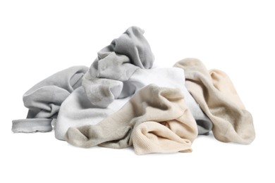 Photo of Different used dirty socks on white background