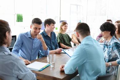 Young people having business training in office