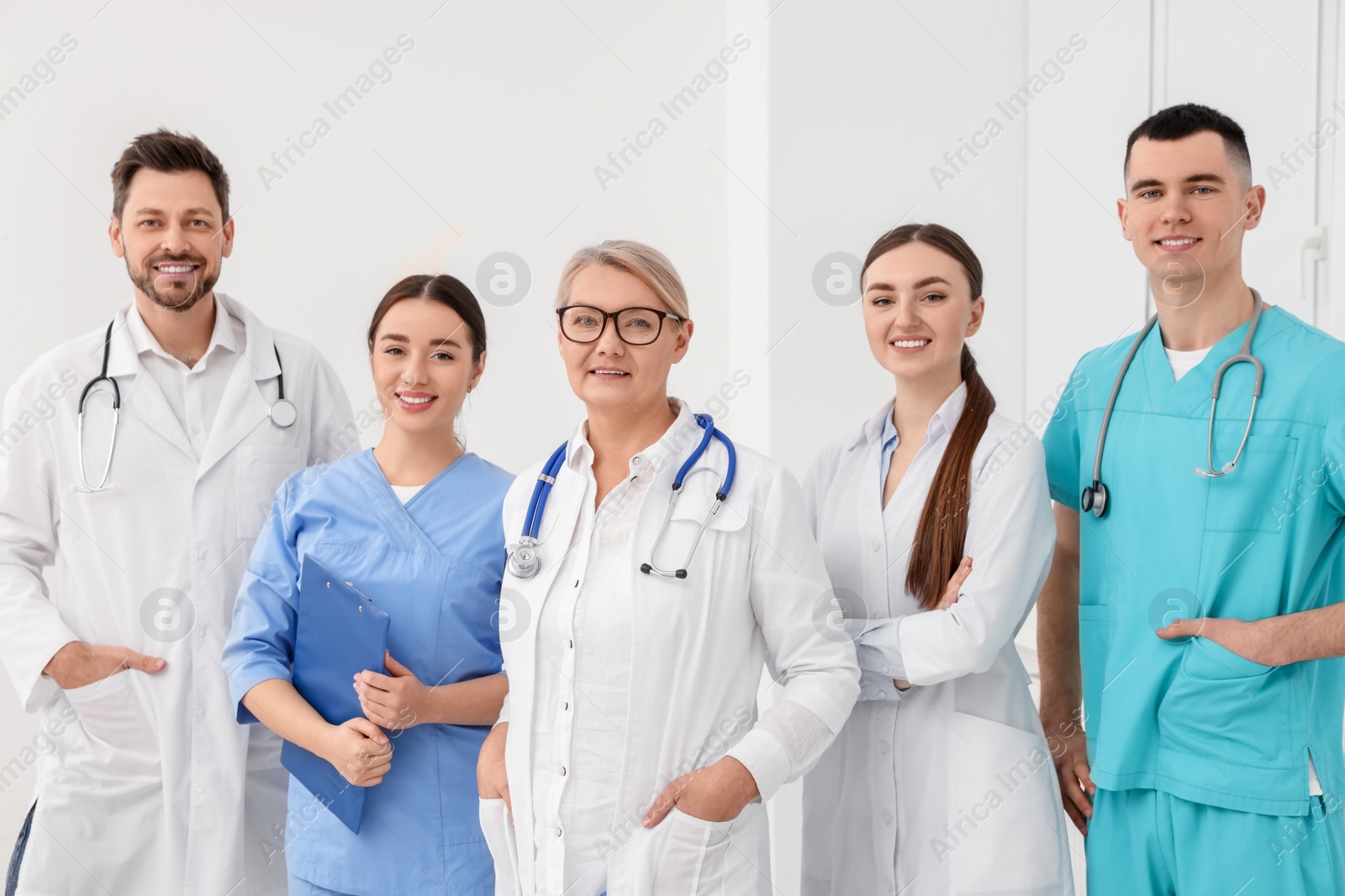 Photo of Portrait of medical doctors wearing uniforms indoors