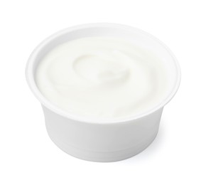 Photo of Delicious natural yogurt in plastic cup isolated on white