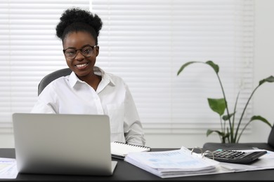 Photo of Professional accountant working on computer at desk in office. Space for text