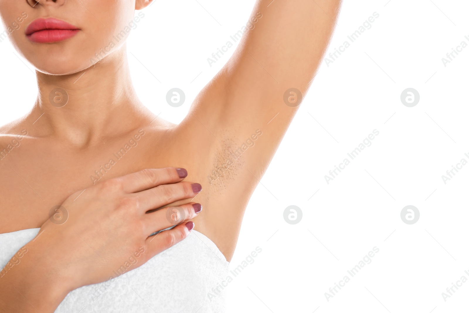 Photo of Young woman showing hairy armpit on white background, closeup. Epilation procedure