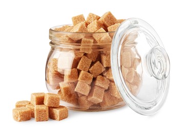 Photo of Glass jar and brown sugar cubes on white background