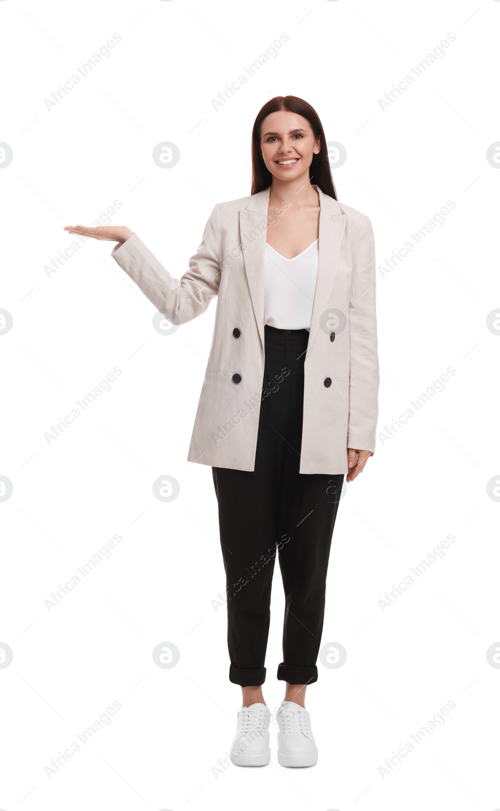 Photo of Beautiful businesswoman in suit pointing at something on white background