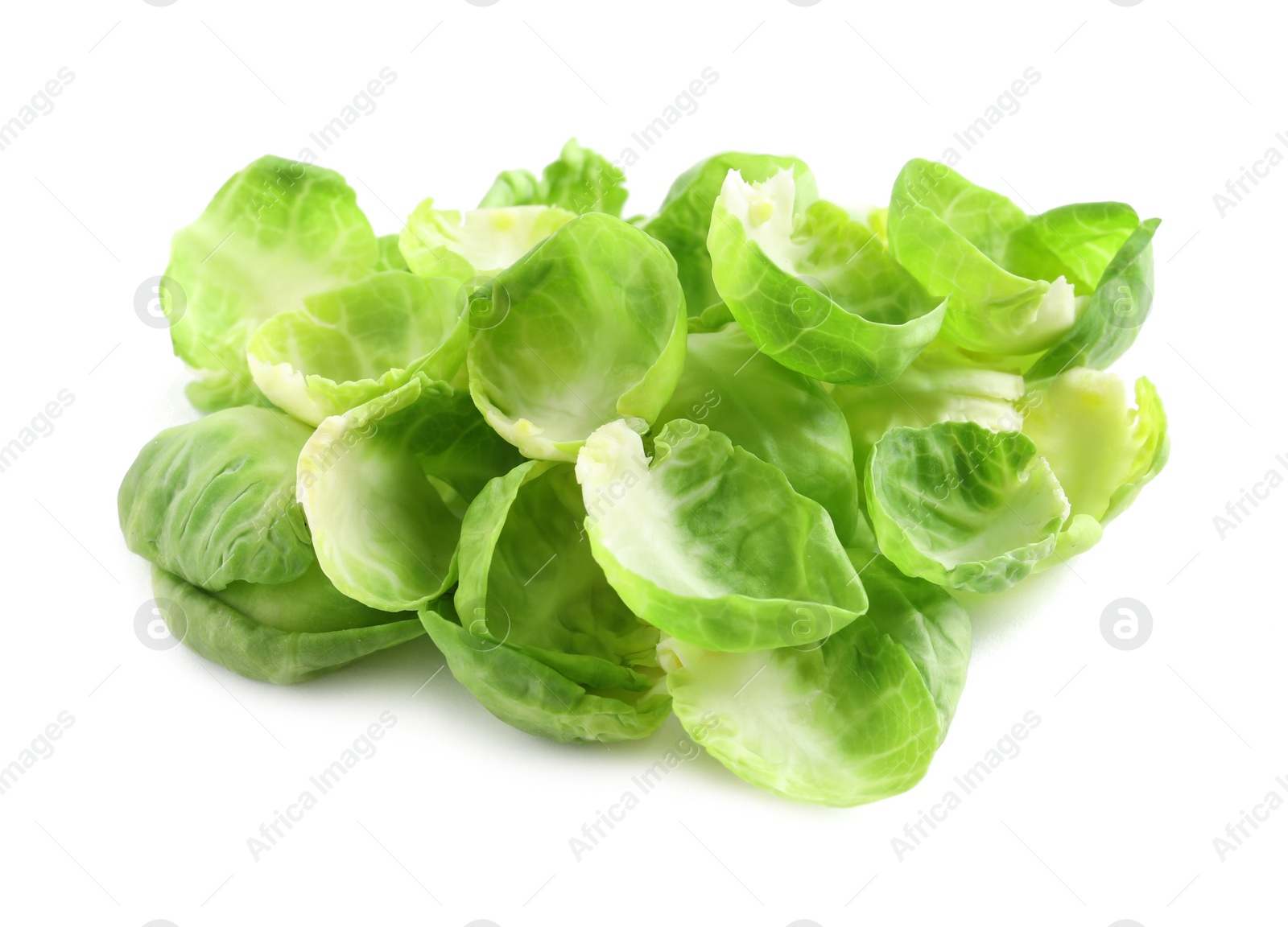 Photo of Leaves of fresh Brussels sprouts isolated on white