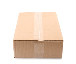 Photo of Closed cardboard box on white background. Mockup for design