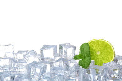 Photo of Ice cubes, mint and lime on white background