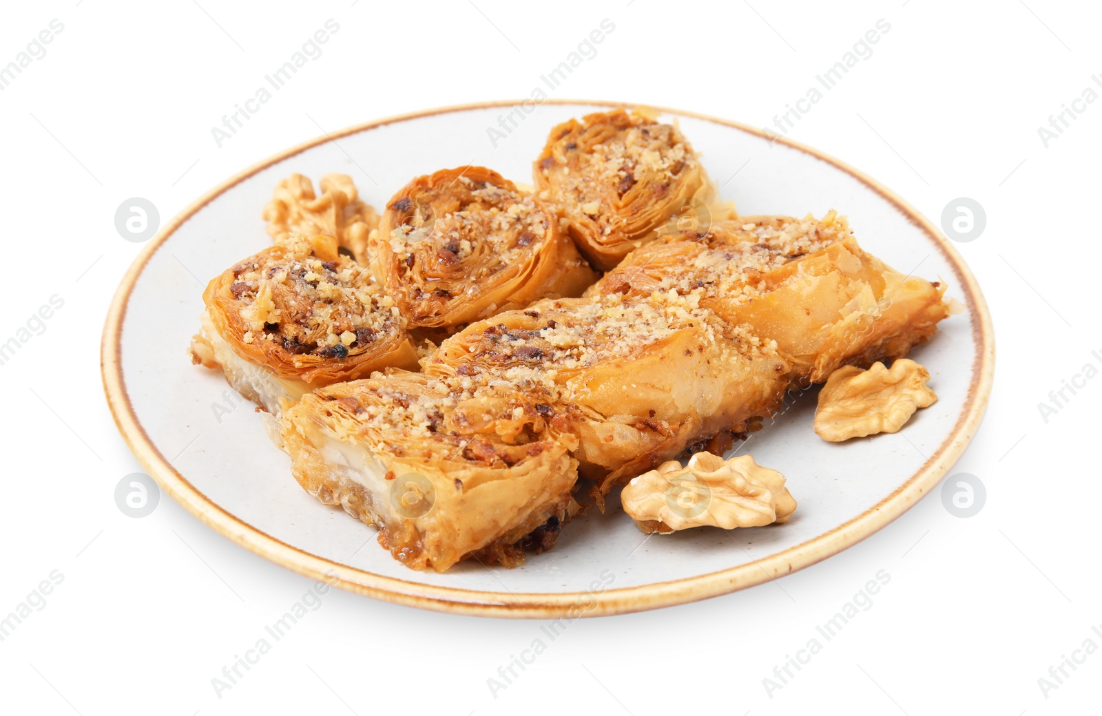 Photo of Eastern sweets. Pieces of tasty baklava isolated on white