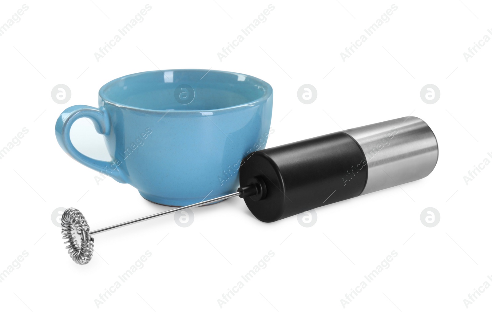 Photo of Milk frother wand and cup isolated on white