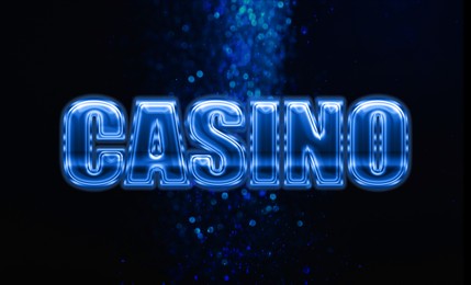 Illustration of Word Casino against blurred lights in darkness. Bokeh effect