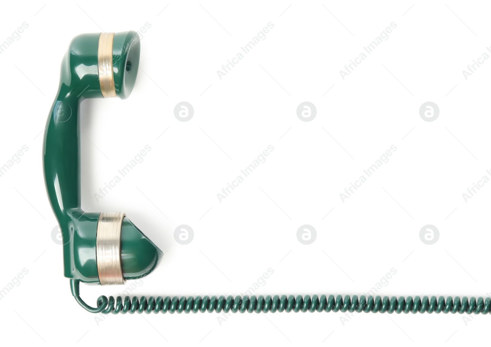 Photo of Handset of vintage green telephone isolated on white