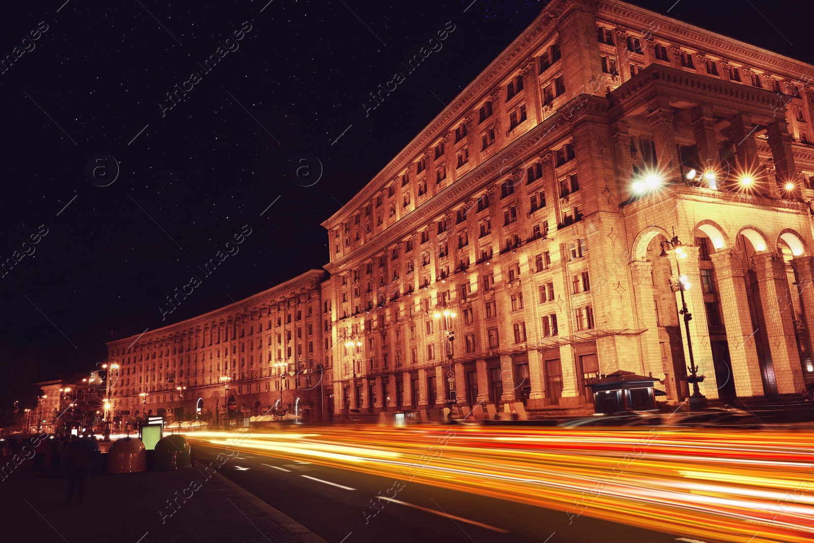 Image of Road traffic, motion blur effect. View of night cityscape with car light trails