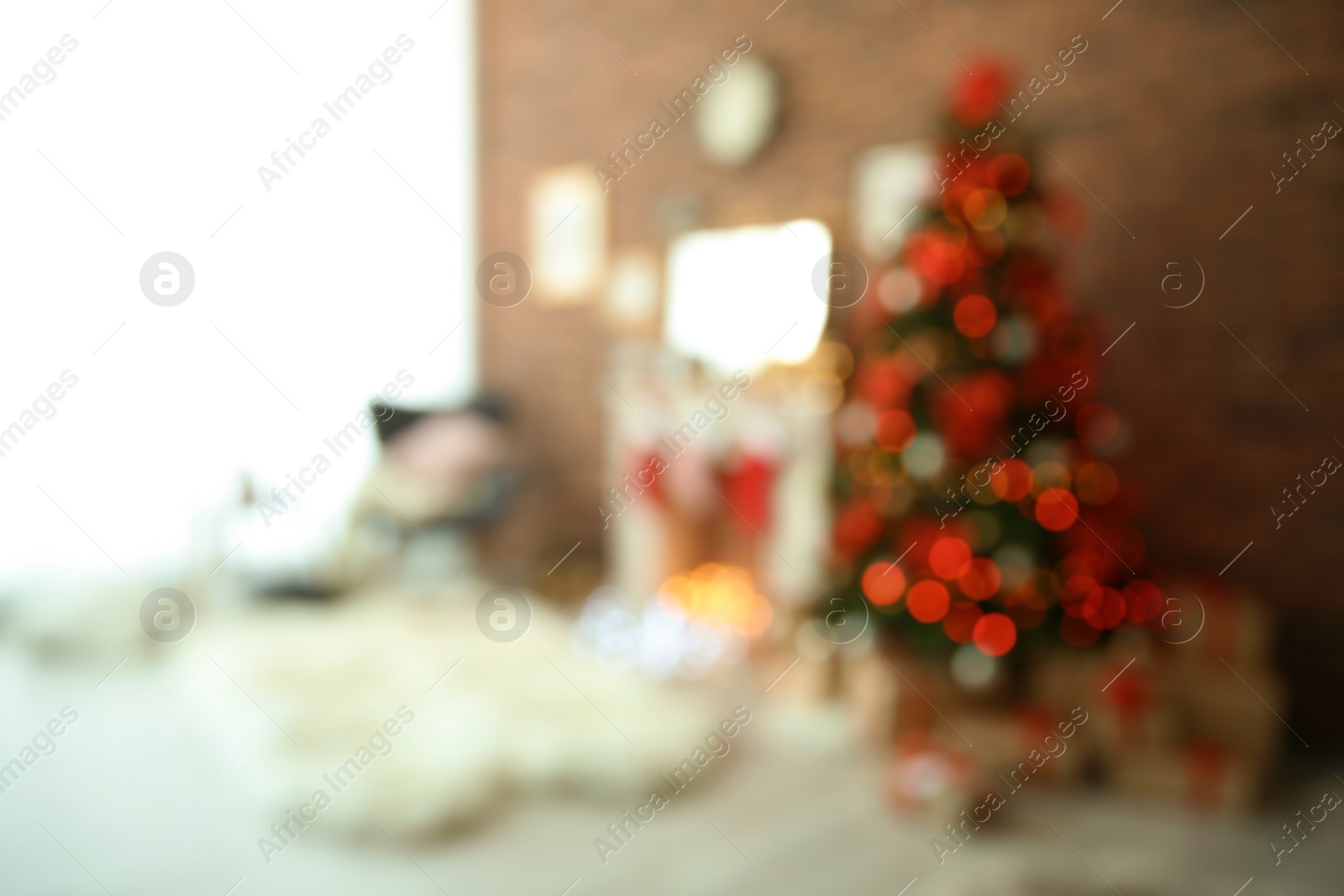 Photo of Blurred view of room with beautiful Christmas tree