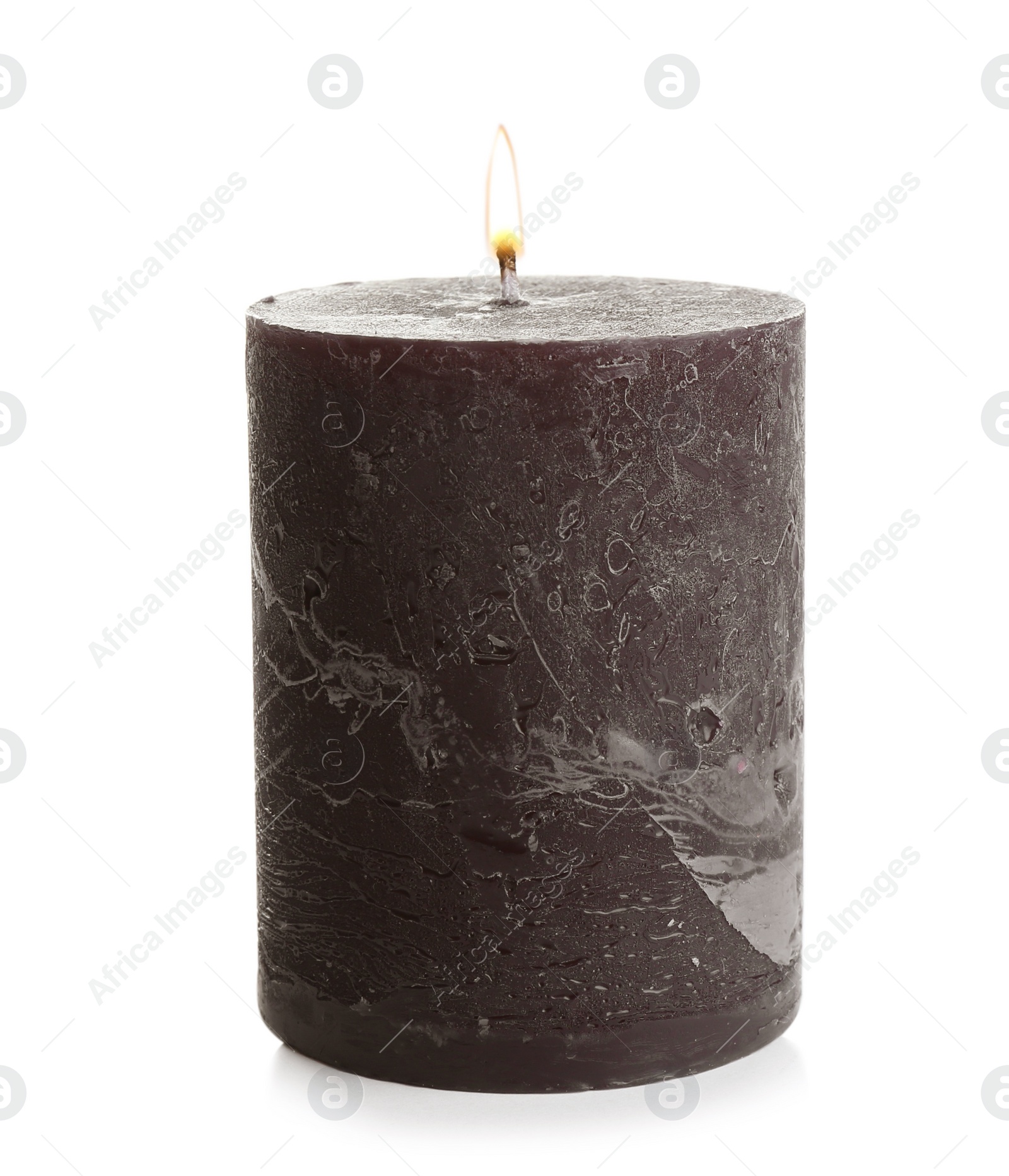 Photo of Dark burning decorative candle isolated on white