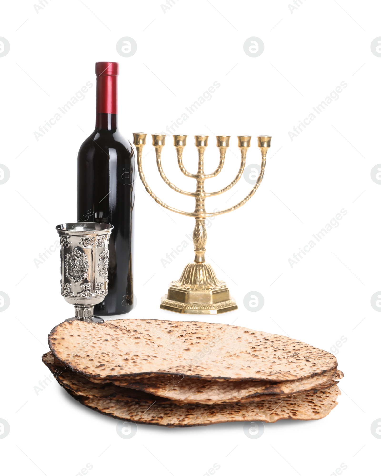 Photo of Tasty matzos, wine and menorah on white background. Passover (Pesach) celebration