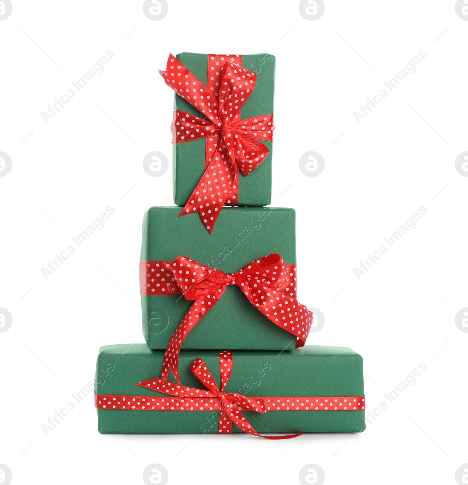 Photo of Stack of Christmas gift boxes on white background