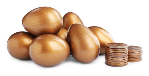 Photo of Many golden eggs and coins on white background. Pension concept