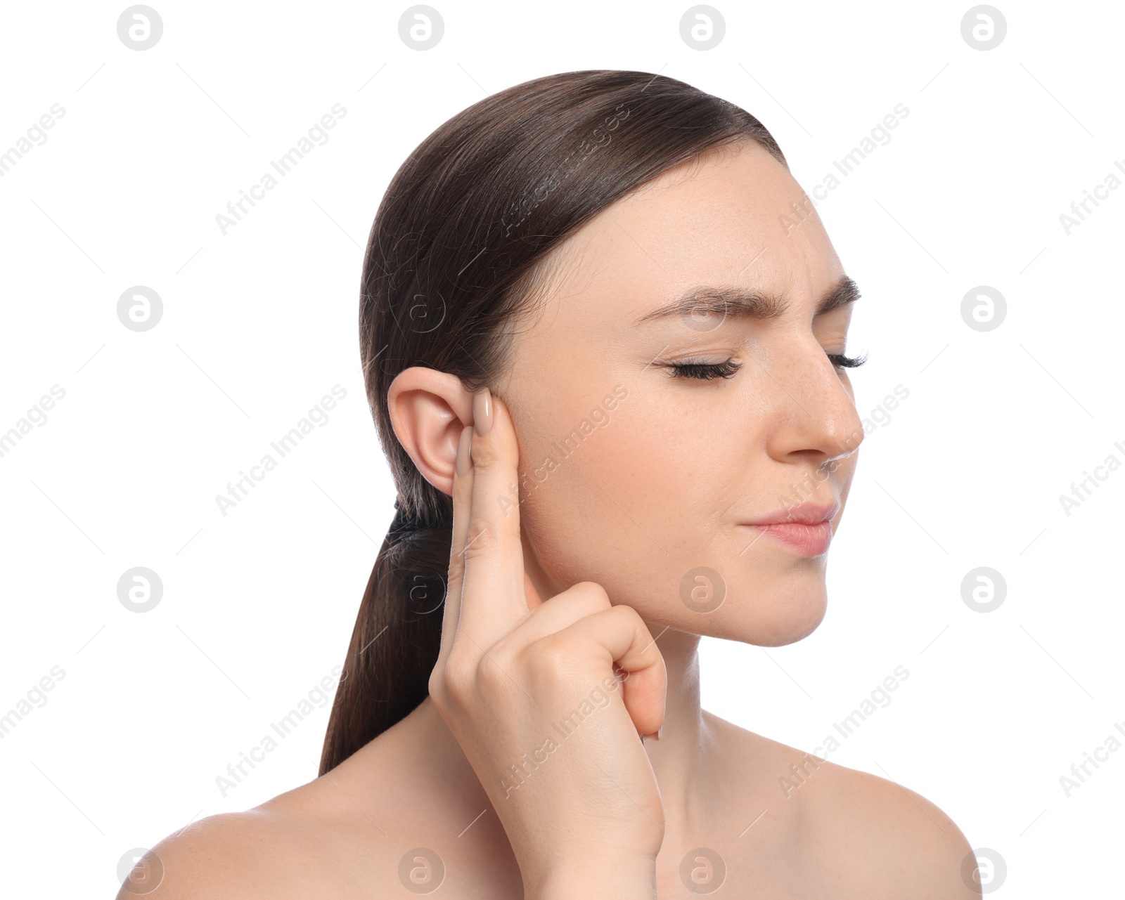 Photo of Young woman suffering from ear pain on white background