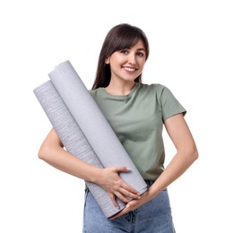 Beautiful woman with wallpaper rolls on white background