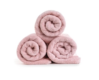 Photo of Rolled soft terry towels on white background