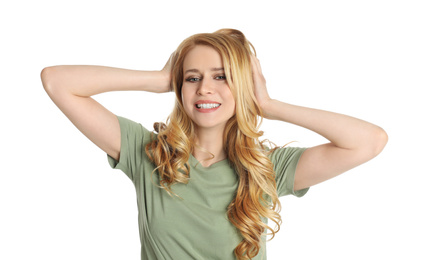 Portrait of beautiful young woman with dyed long hair on white background