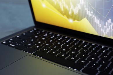 Photo of Laptop on light grey background, closeup. Modern technology