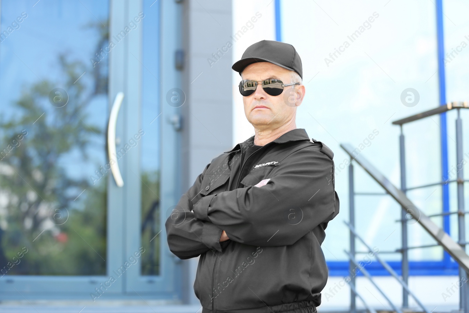 Photo of Portrait of male security guard in uniform outdoors