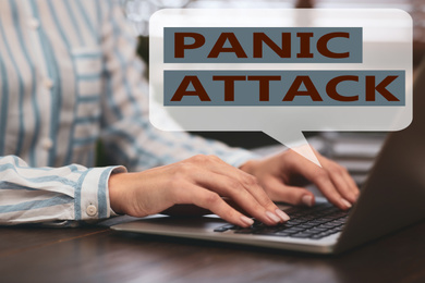 Image of Woman working with laptop, closeup. Use information safely to avoid panic attack