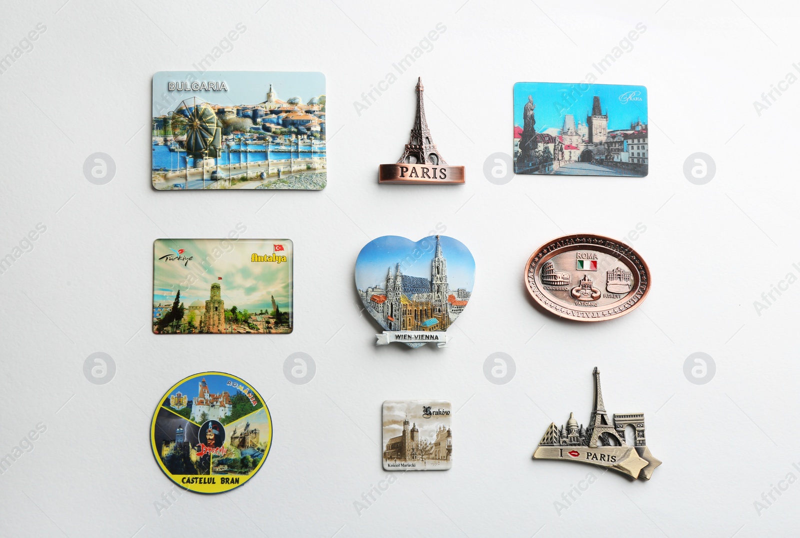 Photo of MYKOLAIV, UKRAINE - DECEMBER 24, 2018: Many different travel magnets on light background