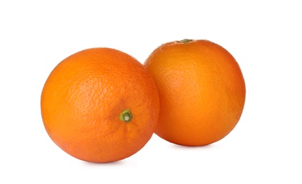 Photo of Fresh ripe oranges isolated on white. Citrus fruit