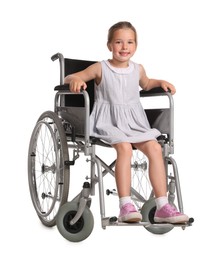 Photo of Little girl in wheelchair on white background