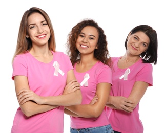 Photo of Group of women with silk ribbons on white background. Breast cancer awareness concept