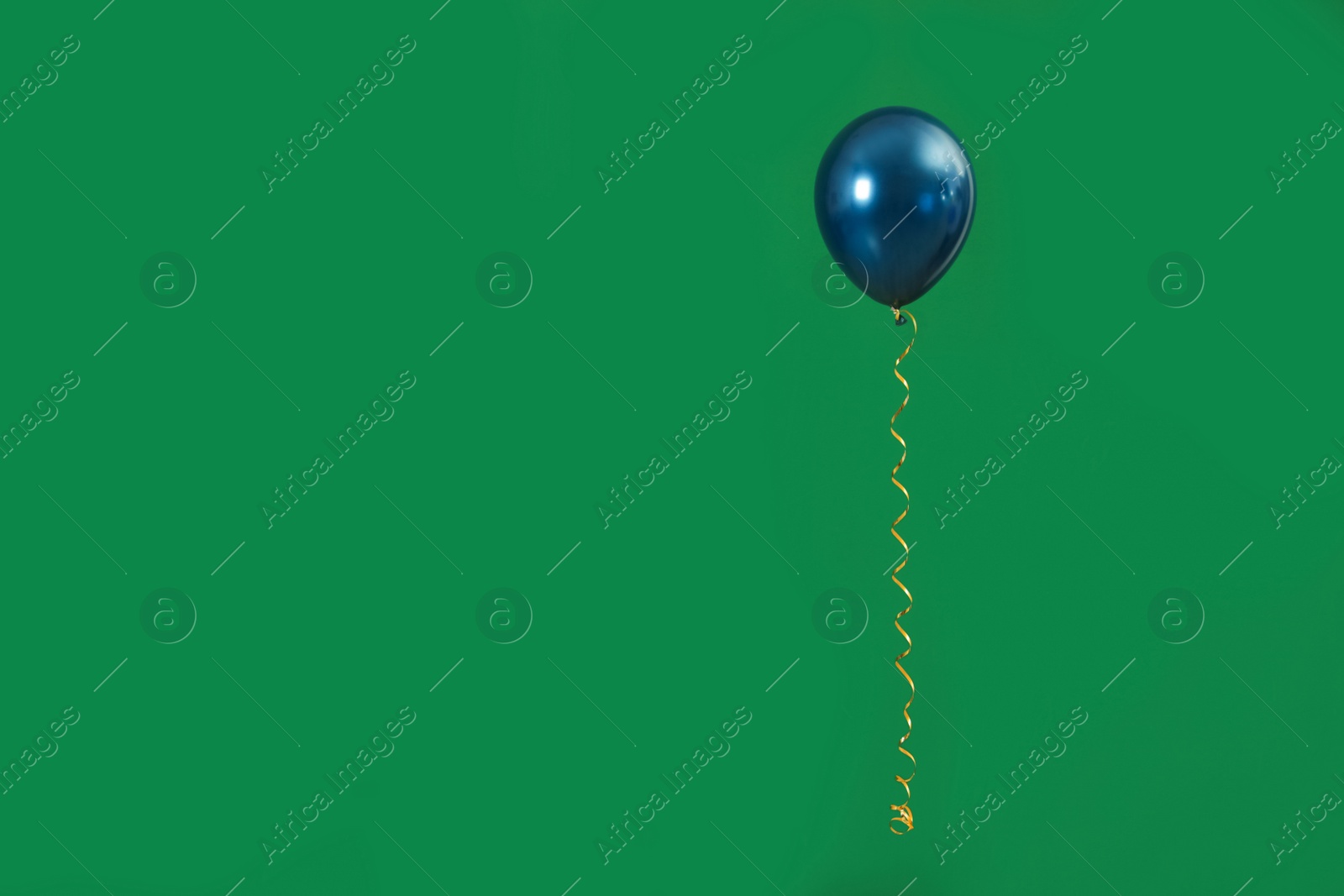 Photo of Bright balloon on color background, space for text. Celebration time