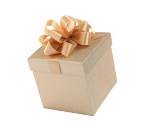 Photo of Beautiful golden gift box on white background