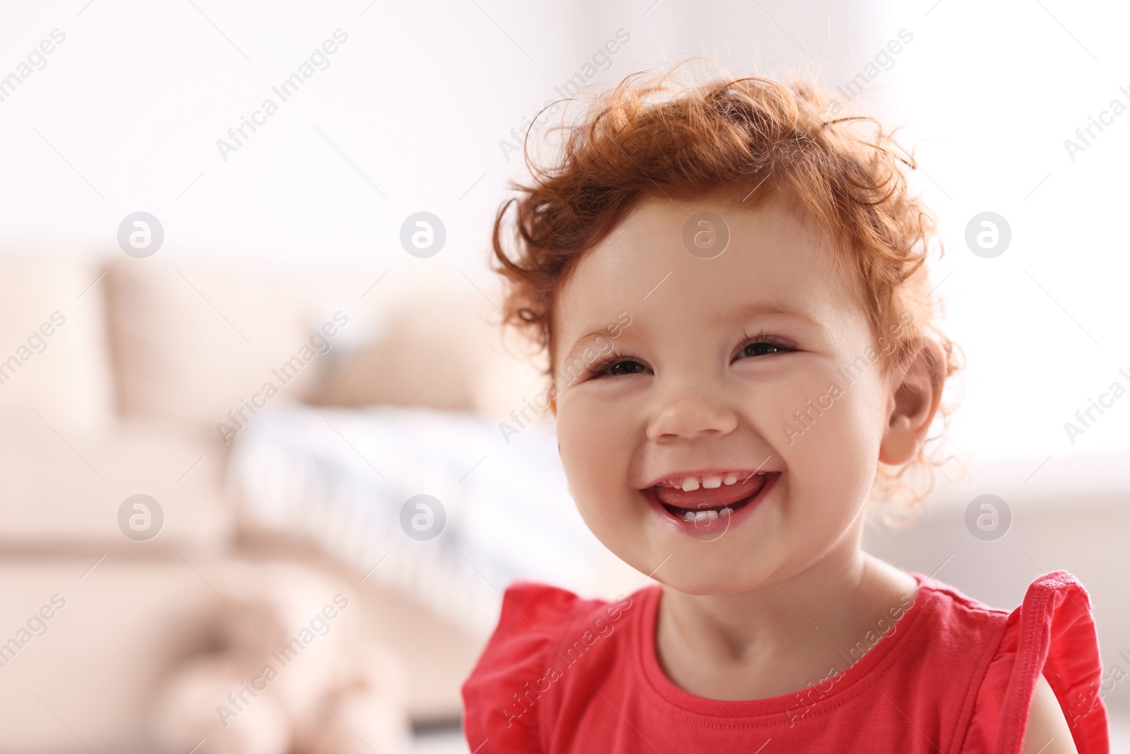 Photo of Portrait of cute little child at home