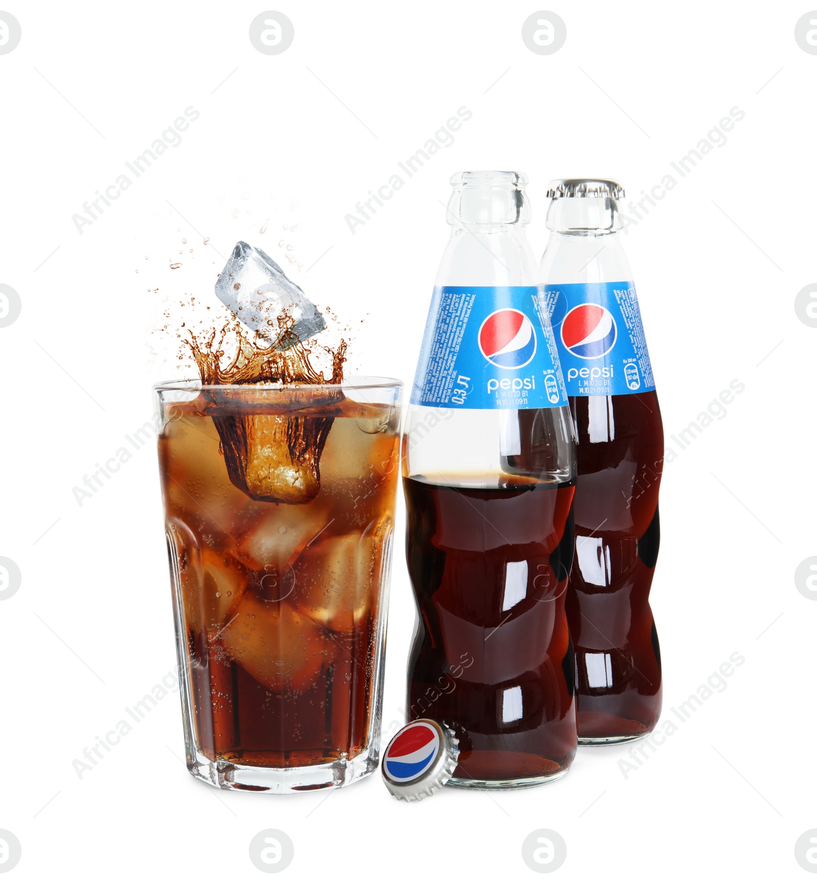 Image of MYKOLAIV, UKRAINE - FEBRUARY 10, 2021: Glass and bottles of Pepsi on white background