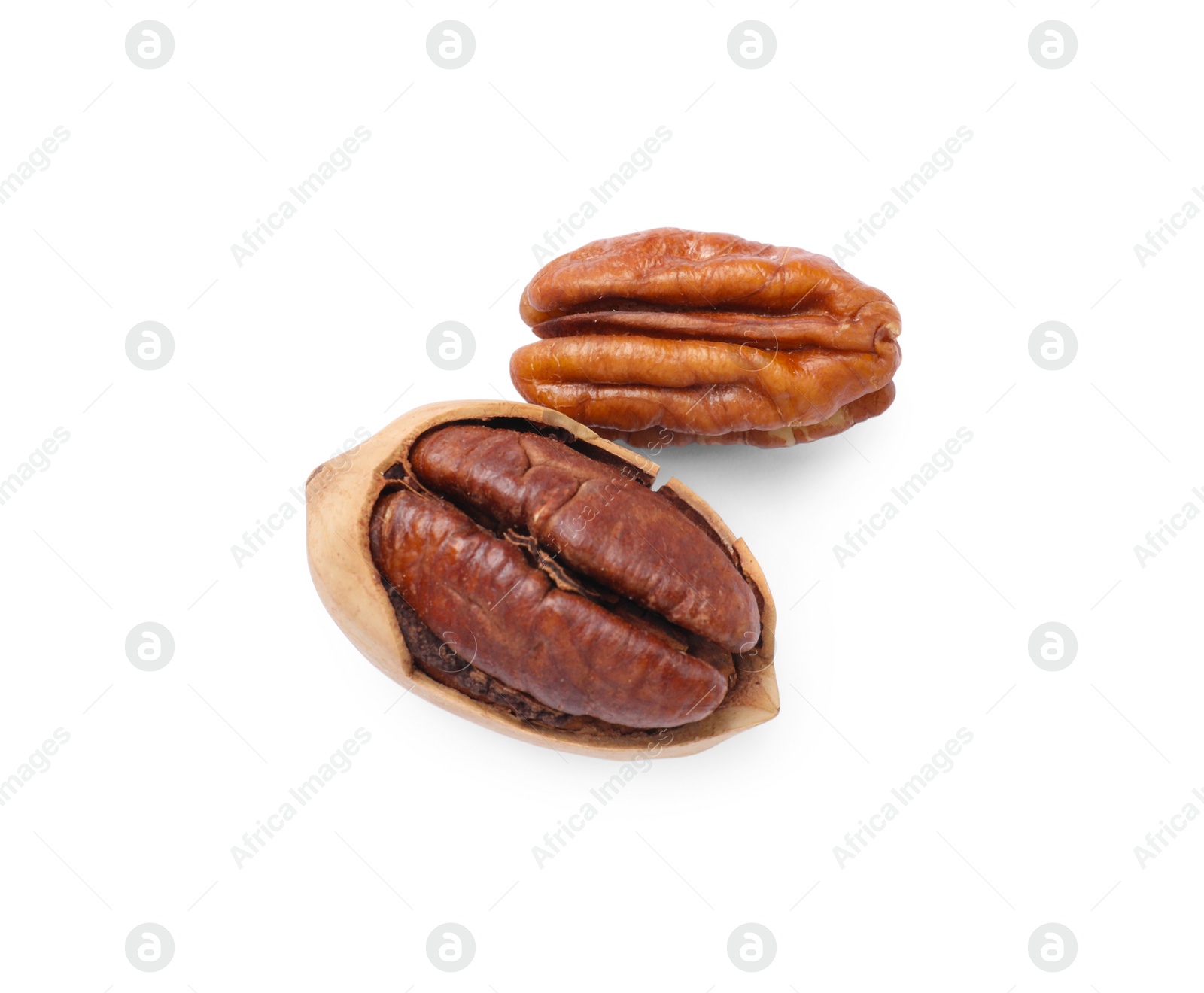 Photo of Two tasty pecan nuts isolated on white, top view