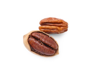 Two tasty pecan nuts isolated on white, top view