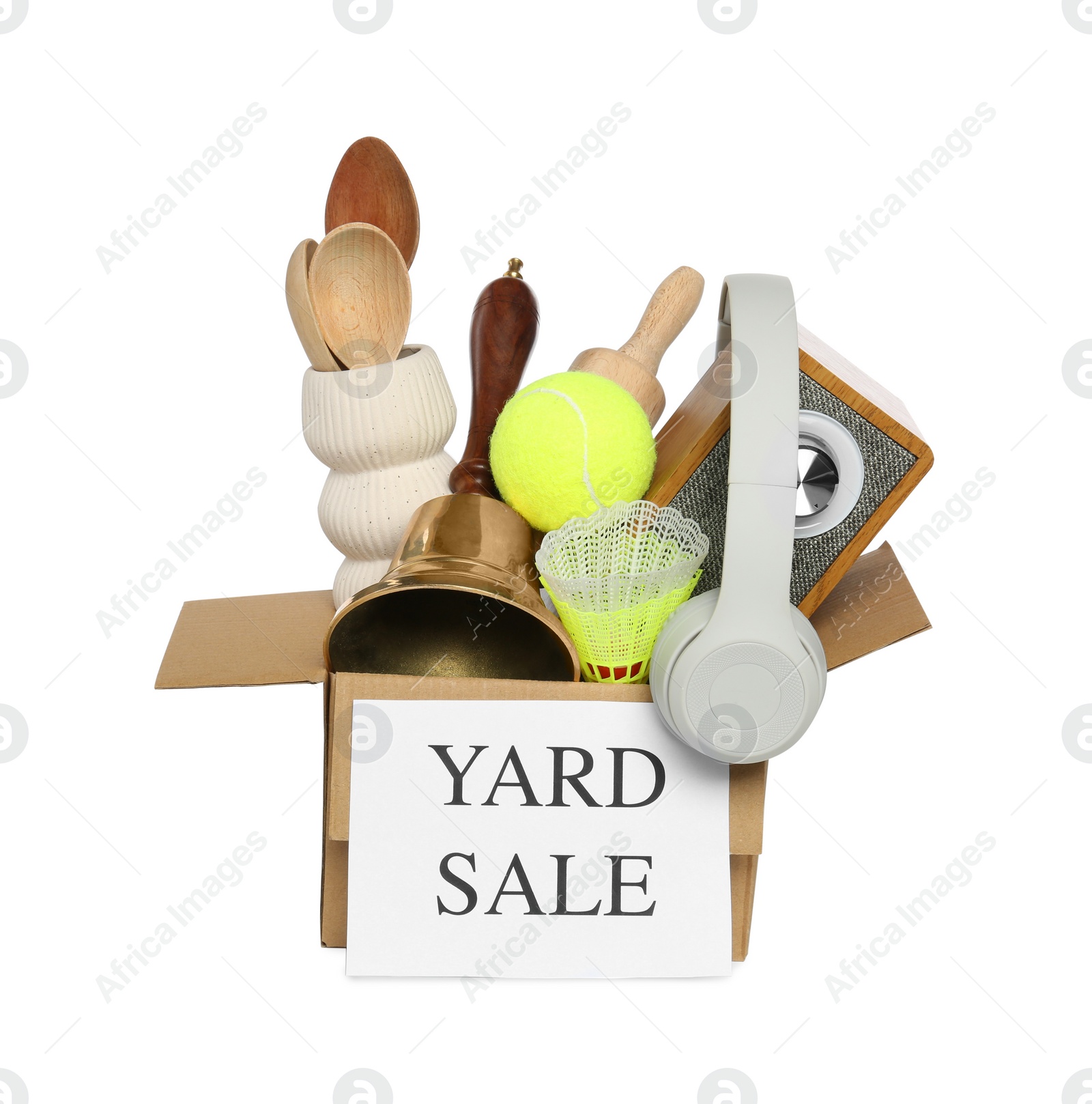 Photo of Sign Yard Sale written on box with different stuff isolated on white