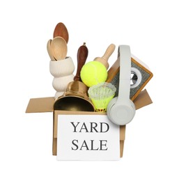Photo of Sign Yard Sale written on box with different stuff isolated on white