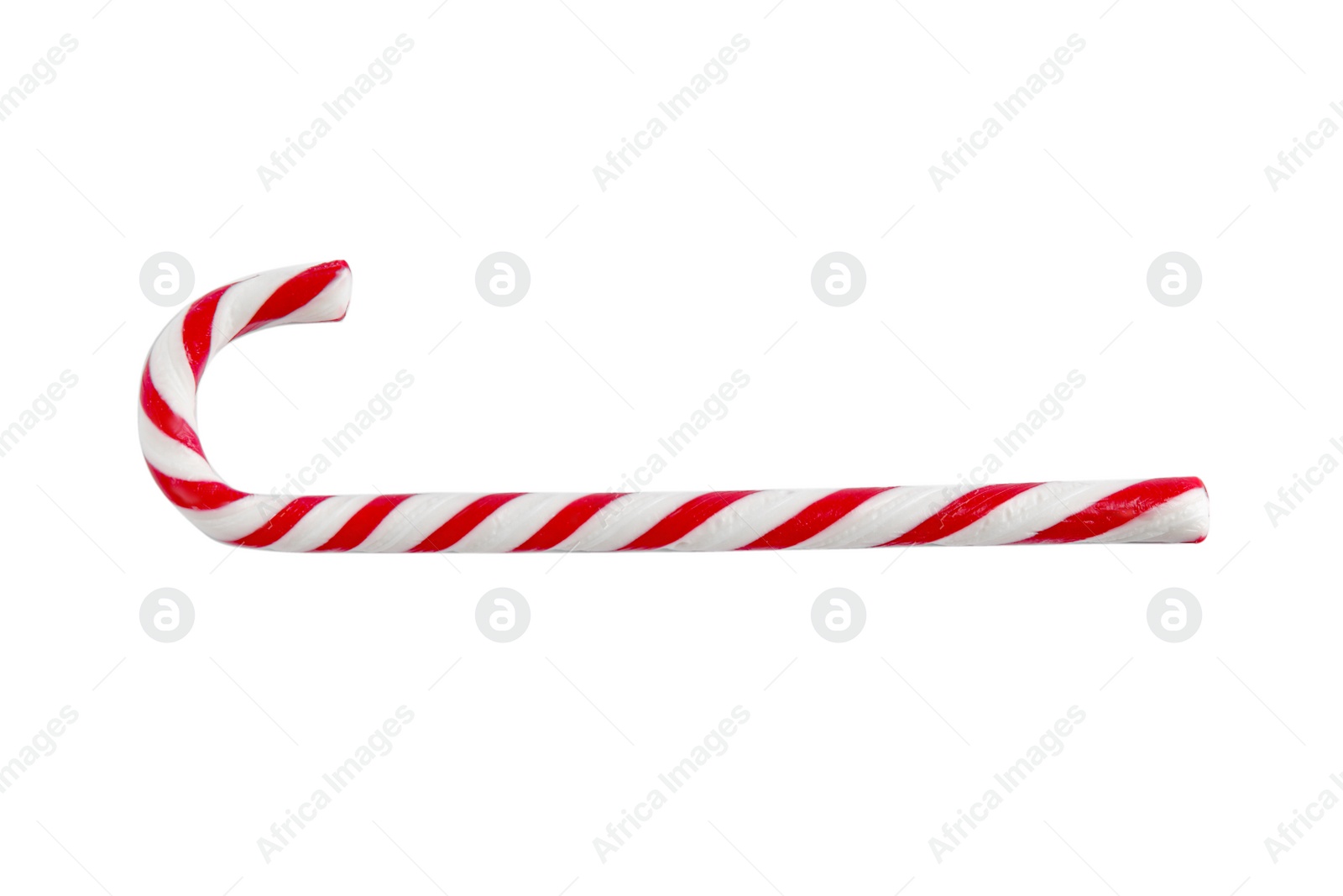 Photo of Candy cane on white background, top view. Traditional Christmas treat