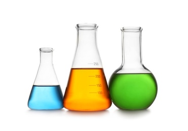 Photo of Chemistry glassware with color samples isolated on white