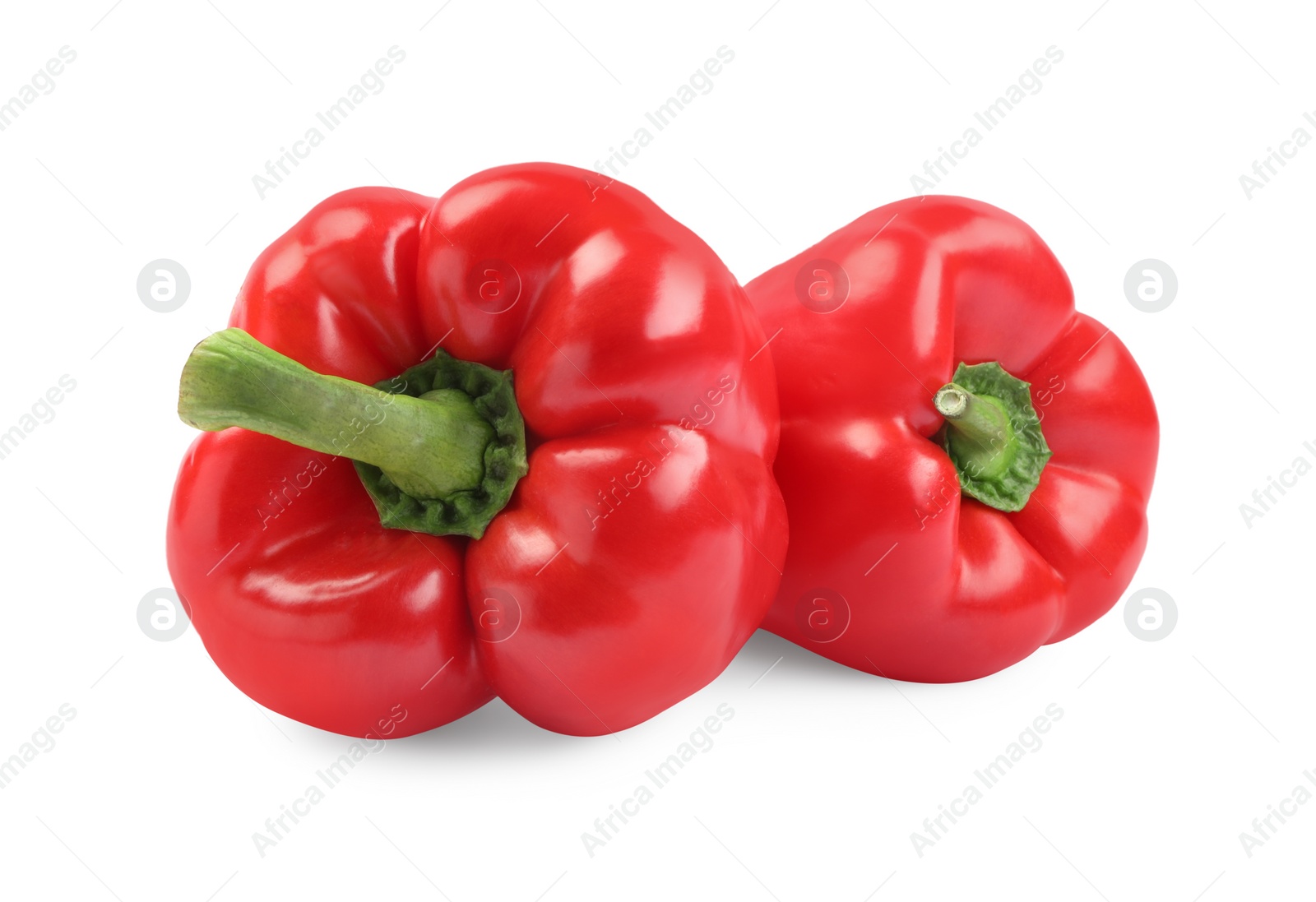 Photo of Ripe red bell peppers isolated on white