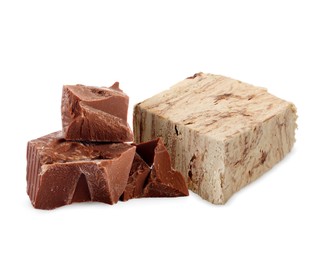 Image of Tasty halva and pieces of chocolate isolated on white