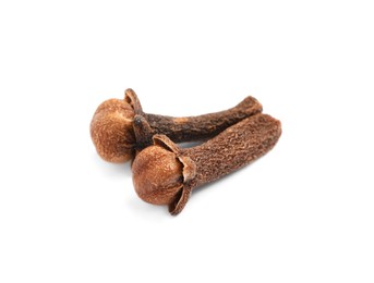 Photo of Aromatic organic dry cloves on white background