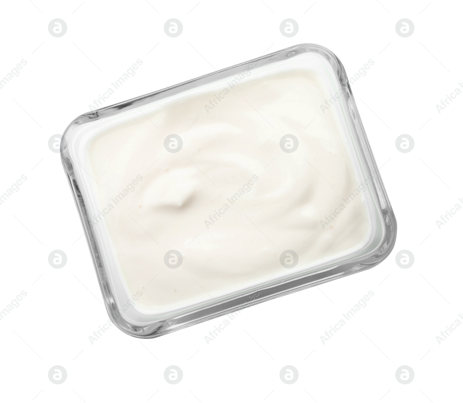 Photo of Glass bowl with yummy yogurt on white background