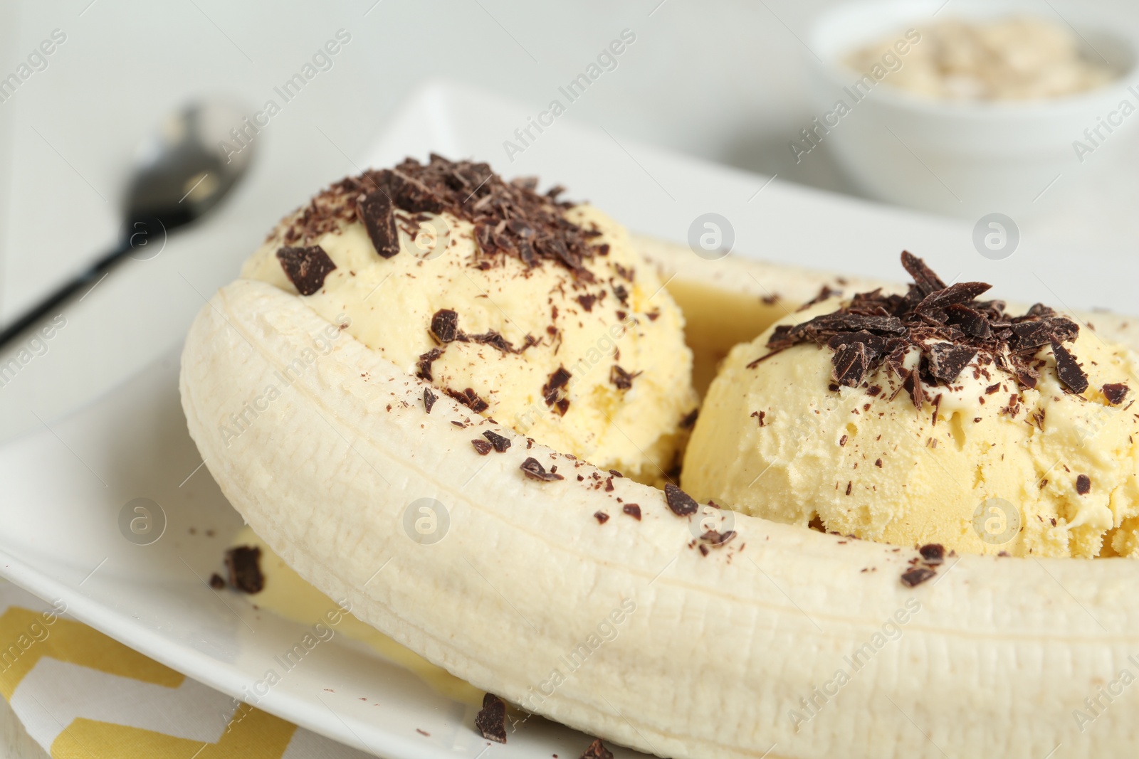 Photo of Delicious banana split ice cream on table, closeup