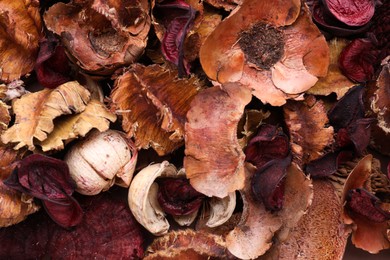 Photo of Scented potpourri of dried flowers as background, top view